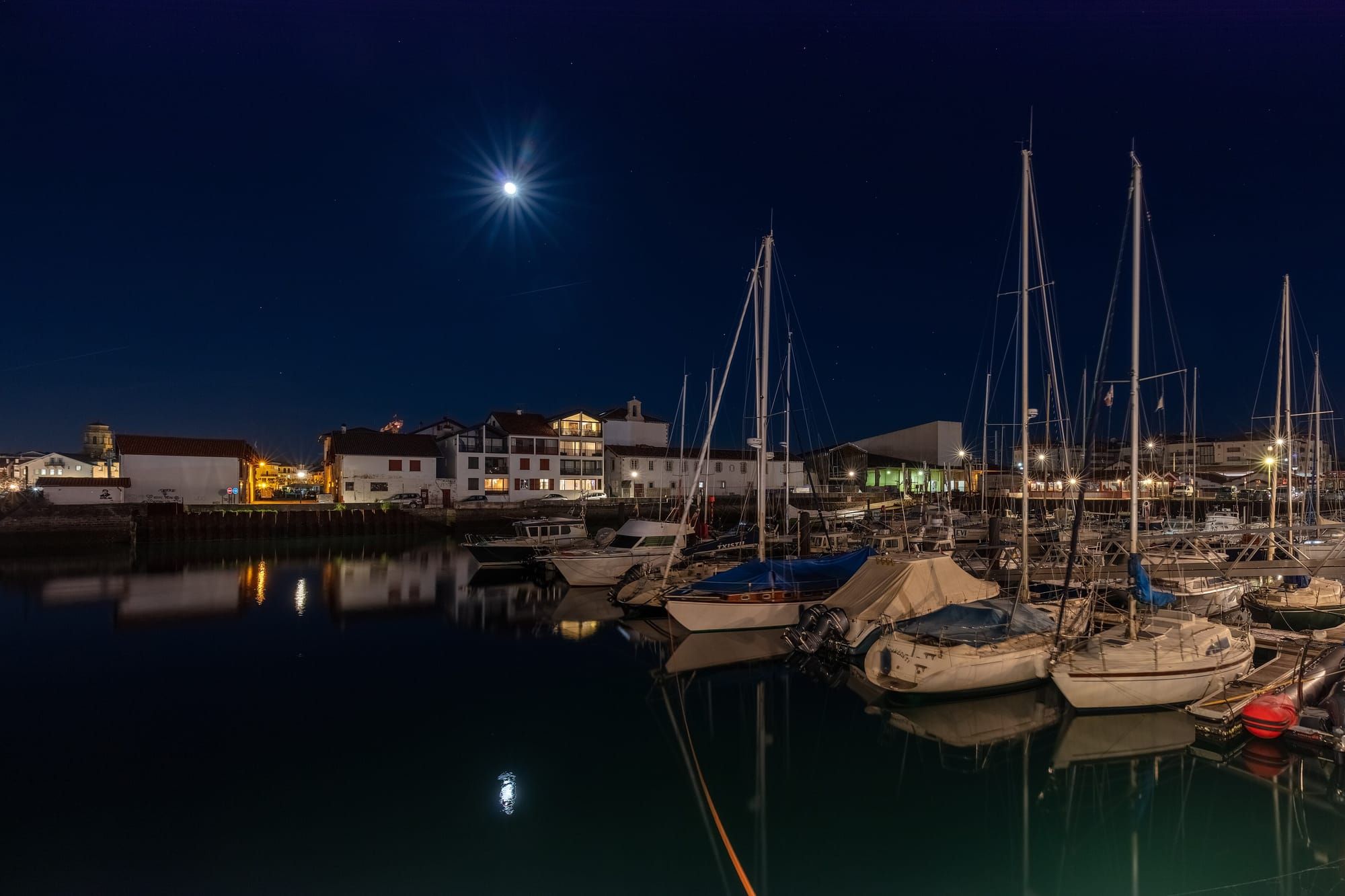 The harbour at Saint-Jean-de-Luz, with boats and the town behind